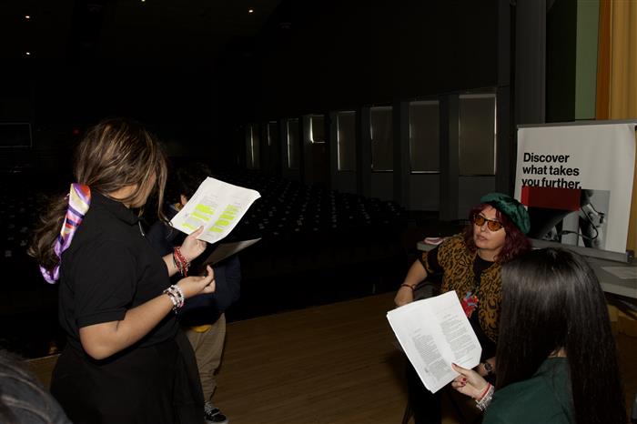 Dr K listening to one of her actors